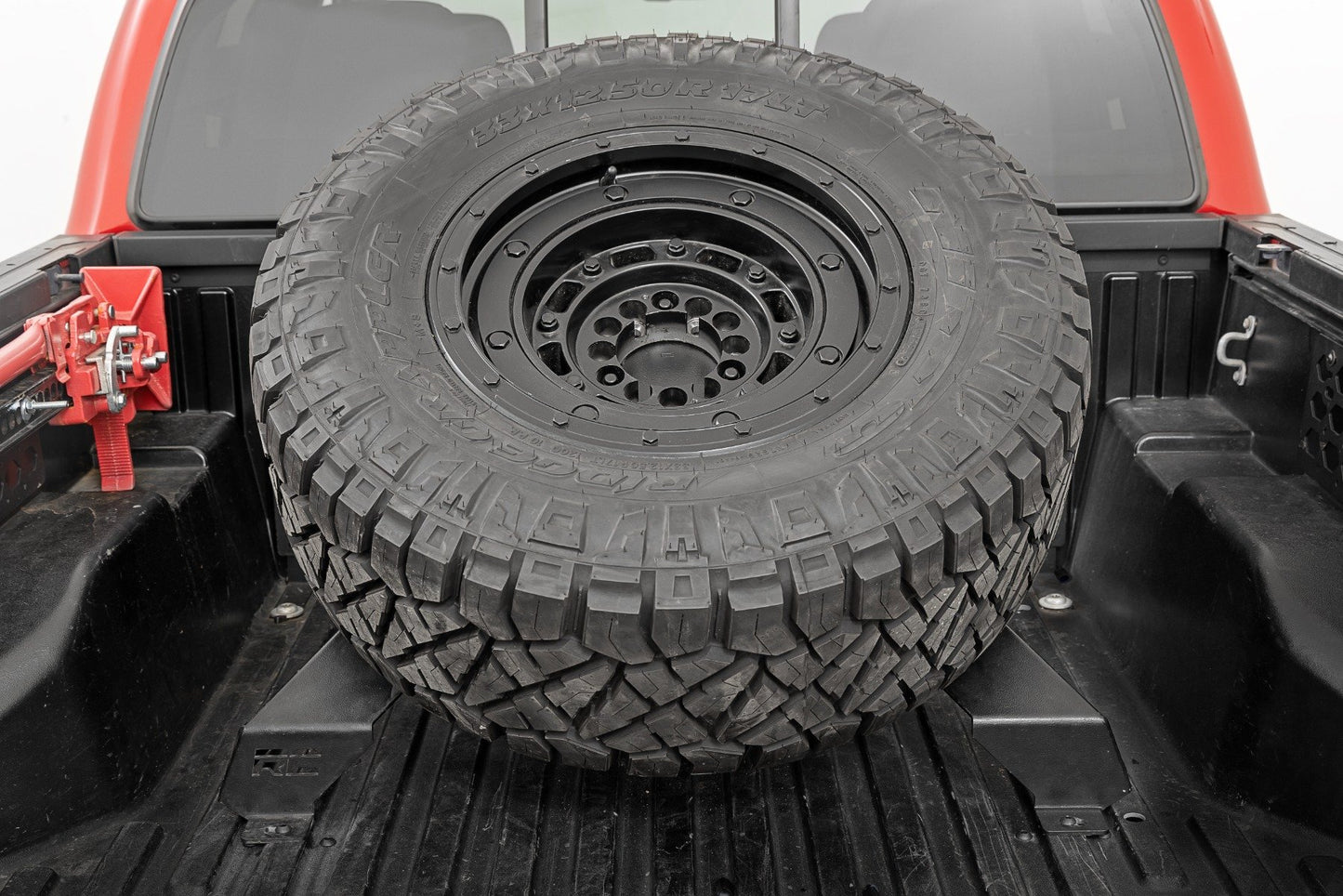 Bed Mount Spare Tire Carrier | Universal (5x5.5 6x5.5 6x135 & 5x5.0 Bolt Patterns) 73110