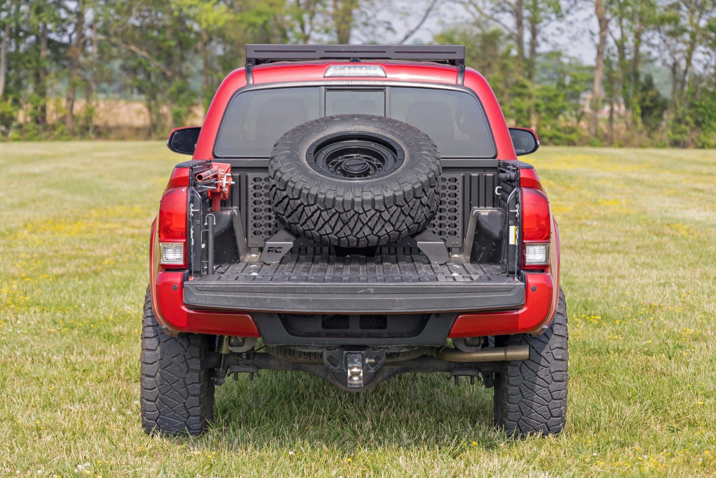 Bed Mount Spare Tire Carrier | Universal (5x5.5 6x5.5 6x135 & 5x5.0 Bolt Patterns) 73110